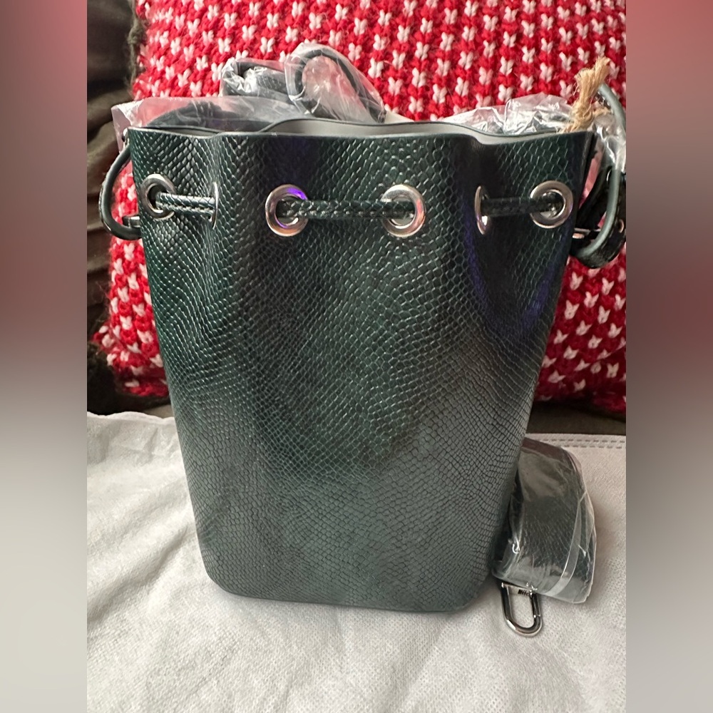 Green vegan Snakeskin print Bucket Bag comes with small pouch and 2 straps.